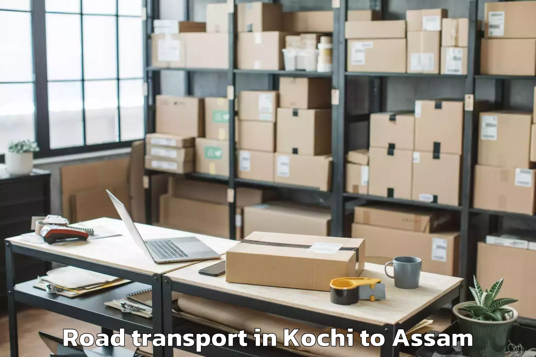 Get Kochi to Laharighat Road Transport